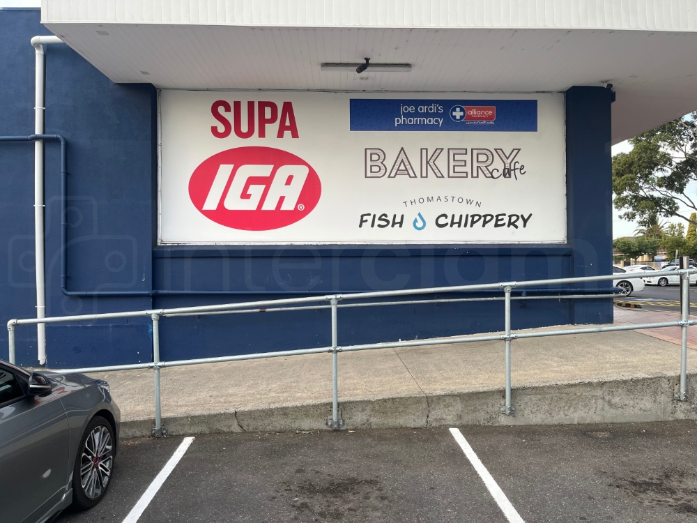 Interclamp standard key clamp guardrail installed at a busy retail park